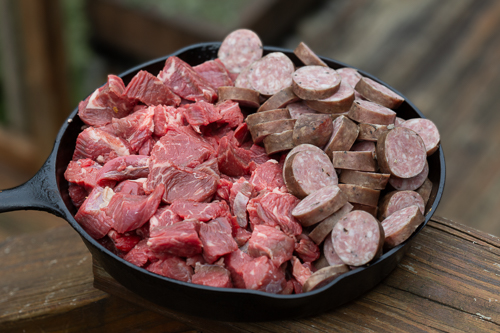Cubed chuck roast, and sliced double smoked sausage.